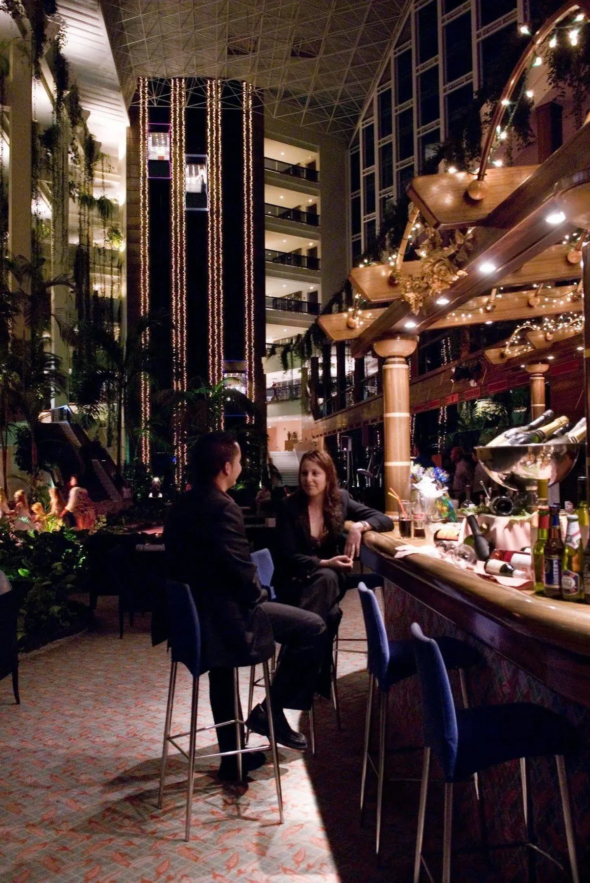 Casino resort evening with dining and performance spaces